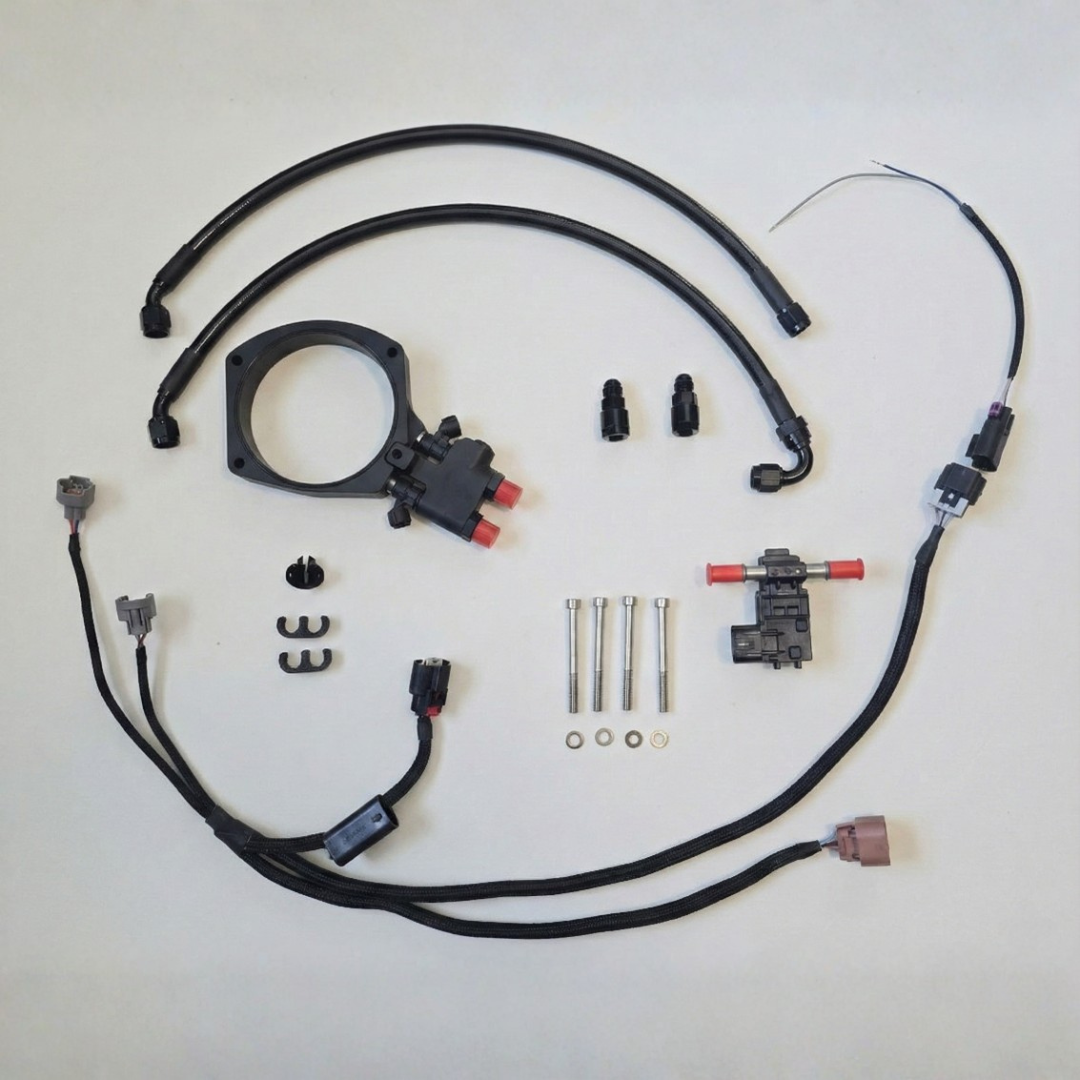 The complete Wisher Performance AuxJection kit including, the billet injection plate, plug-and-play wiring harness, and custom fuel line assembly