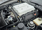 AuxJection LT4 auxiliary fuel injection system with black anodized plate installed on a Camaro ZL1, validated for 1130HP with zero external controllers.